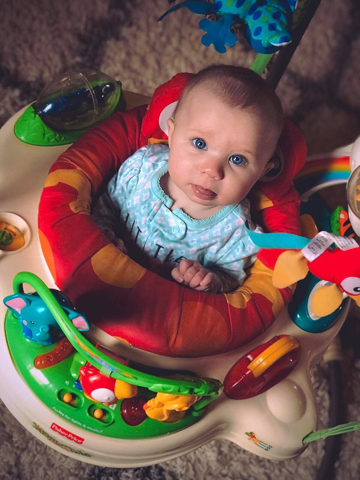 Julianne is registered to the contest to win money with this photo: baby, baby_toys, cheek, child, eating, fun, person, play, product, sitting, skin, smile, toddler, toy