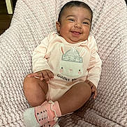 Quelahni joined the competition — help win amazing prizes! baby, smiling, infant, onesie, pink, socks, blanket, cute, happy, child, portrait, indoors, soft, cozy, seated, textile, face, skin, hand, footwear
