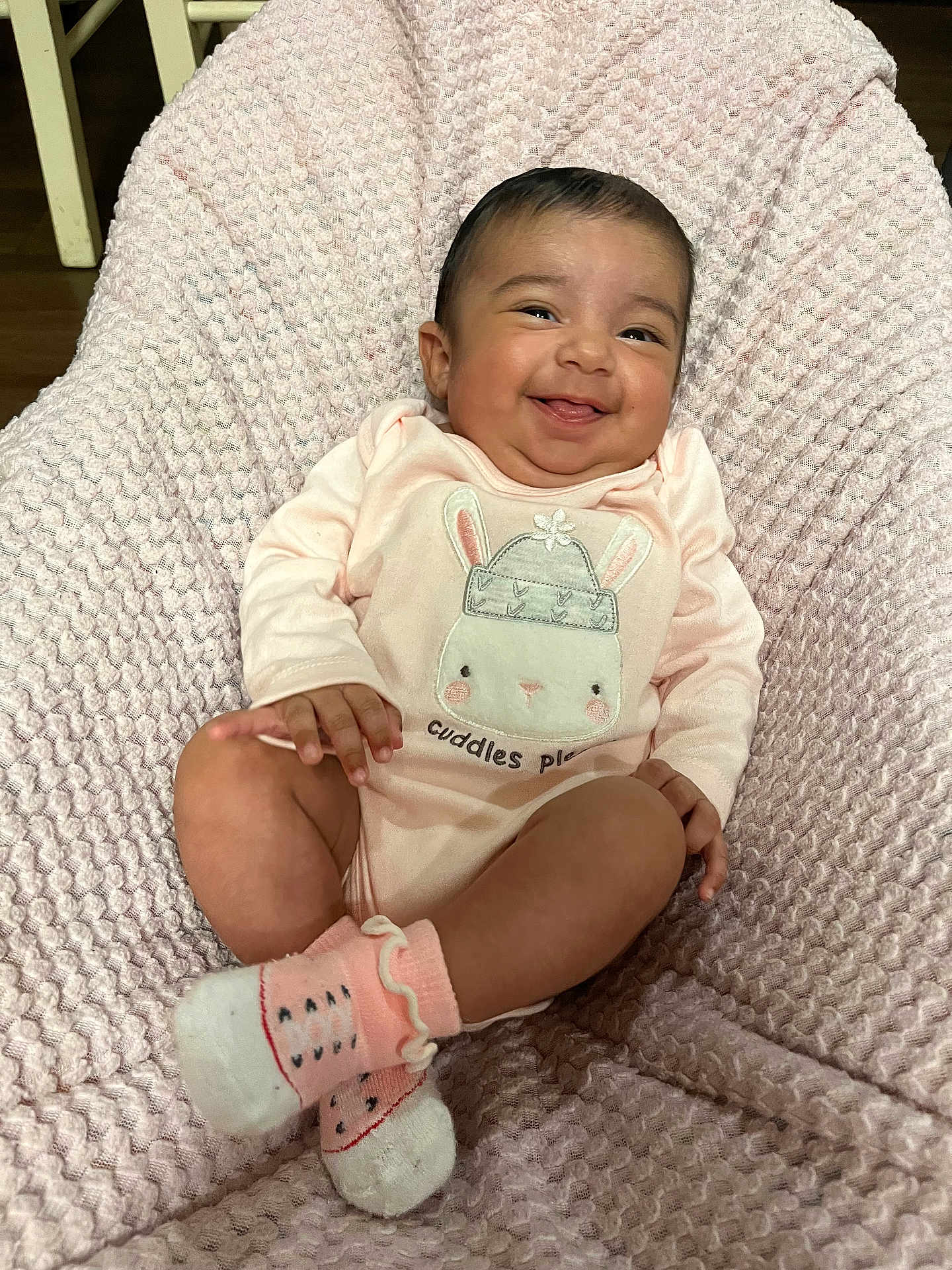 Quelahni joined the competition — help win amazing prizes! baby, smiling, infant, onesie, pink, socks, blanket, cute, happy, child, portrait, indoors, soft, cozy, seated, textile, face, skin, hand, footwear