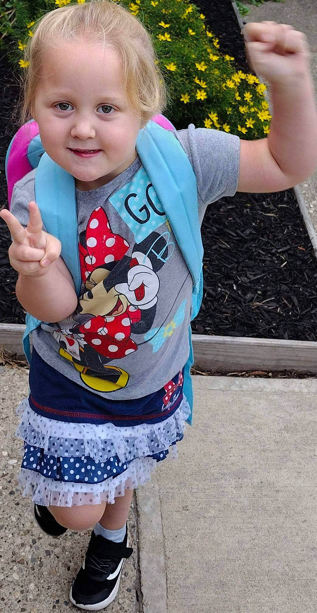 Delaney joined the competition — help win amazing prizes! arm, baby, baby_toddler_clothing, blue, clothing, cool, finger, gesture, green, hairstyle, hand, happy, joy, outerwear, person, pink, plant, sleeve, smile, standing