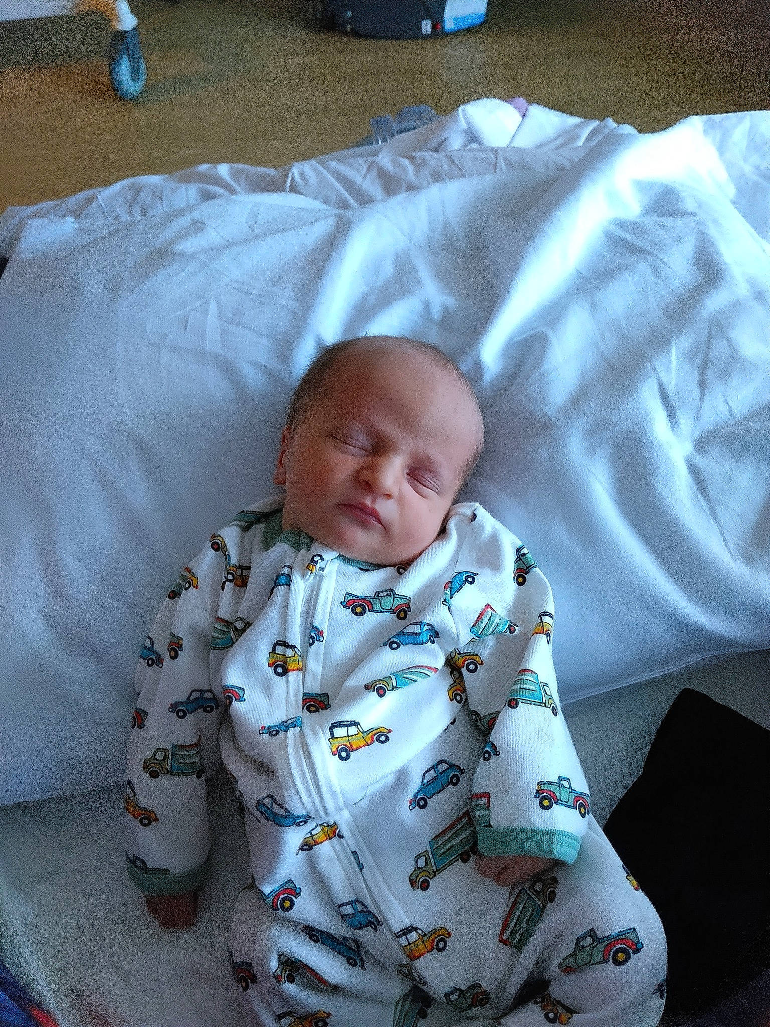 Curtis joined the competition — help win amazing prizes! baby, baby_products, baby_toddler_clothing, cheek, child, comfort, facial_expression, flooring, head, linens, mouth, pattern, person, room, sitting, sleeve, toddler, white