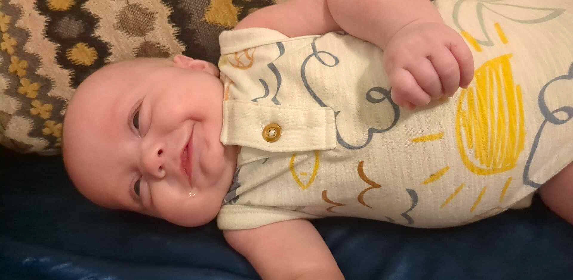 Keenan joined the competition — help win amazing prizes! baby, baby_toddler_clothing, cheek, child, comfort, facial_expression, finger, hand, human_body, leg, mammal, mouth, muscle, nail, neck, nose, person, skin, sleeve, thigh