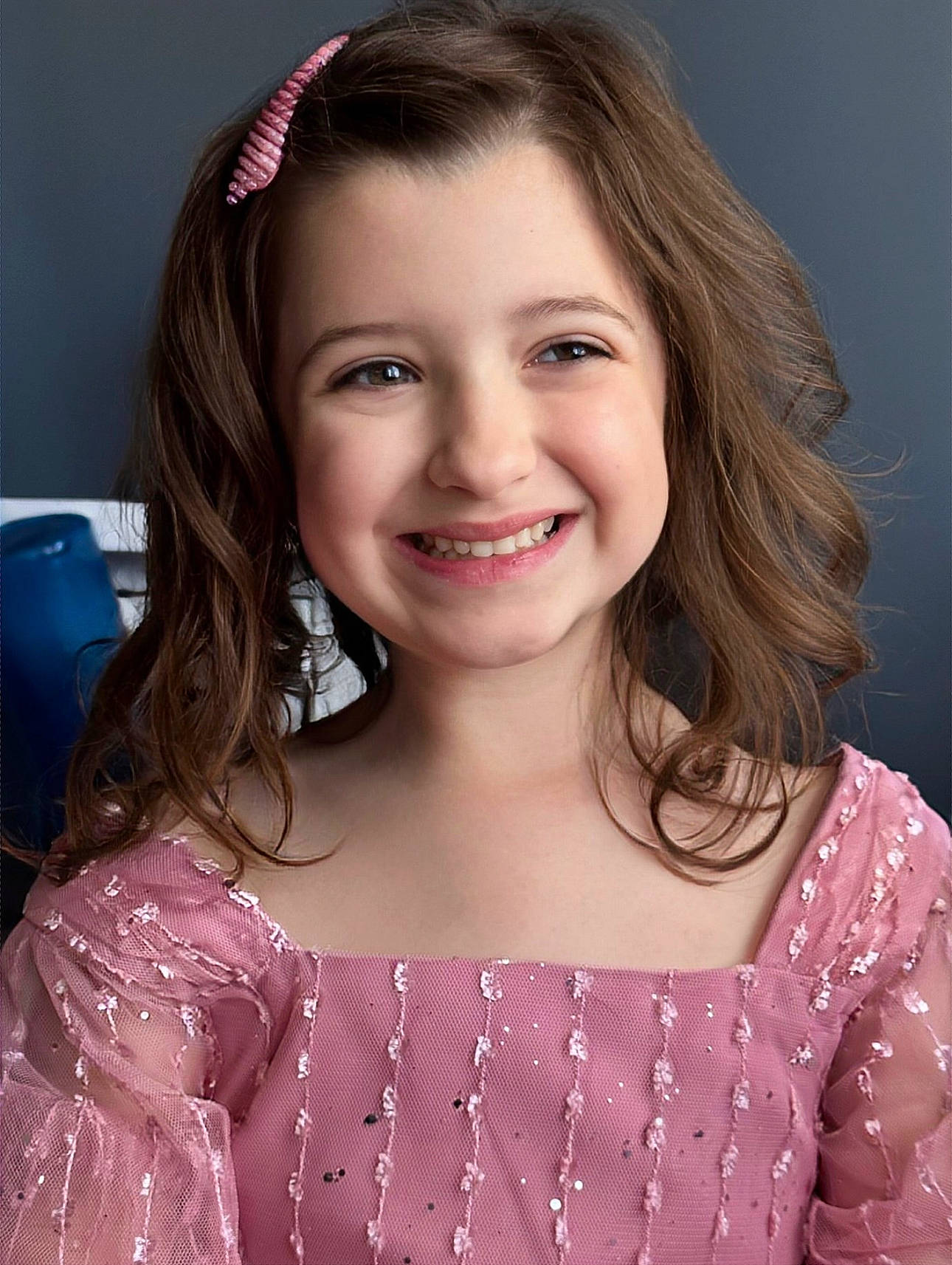 Lorelai is registered to the contest to win money with this photo: blond, brown_hair, child, day_dress, embellishment, event, eyebrow, eyelash, face, flash_photography, fun, hair, happy, iris, joy, long_hair, pattern, person, pink, skin