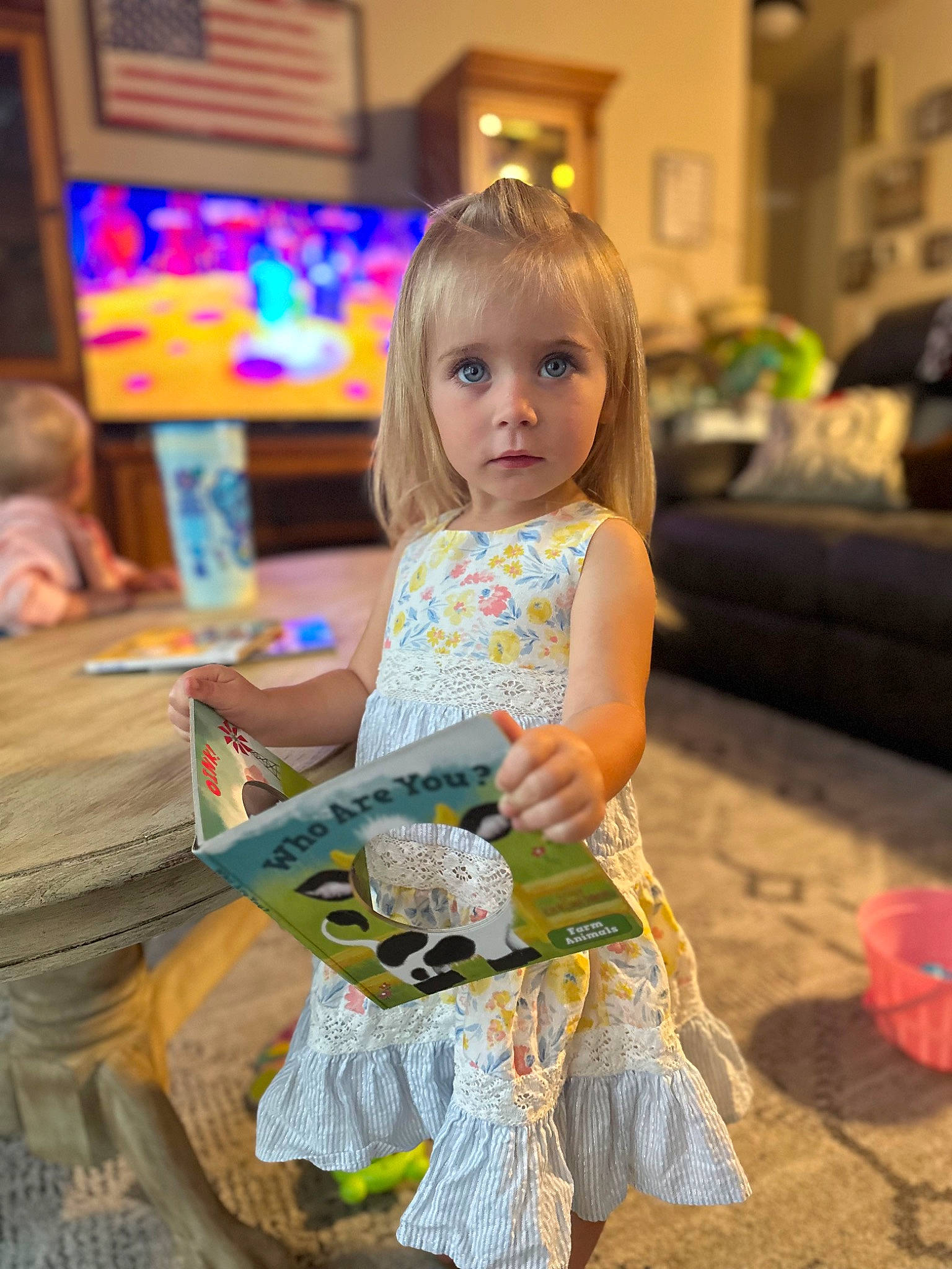 Braelyn is registered to the contest to win money with this photo: child, costume, dress, event, fashion_design, flooring, fun, hairstyle, happy, leisure, party, person, play, recreation, room, sitting, t_shirt, toddler, tradition, vacation