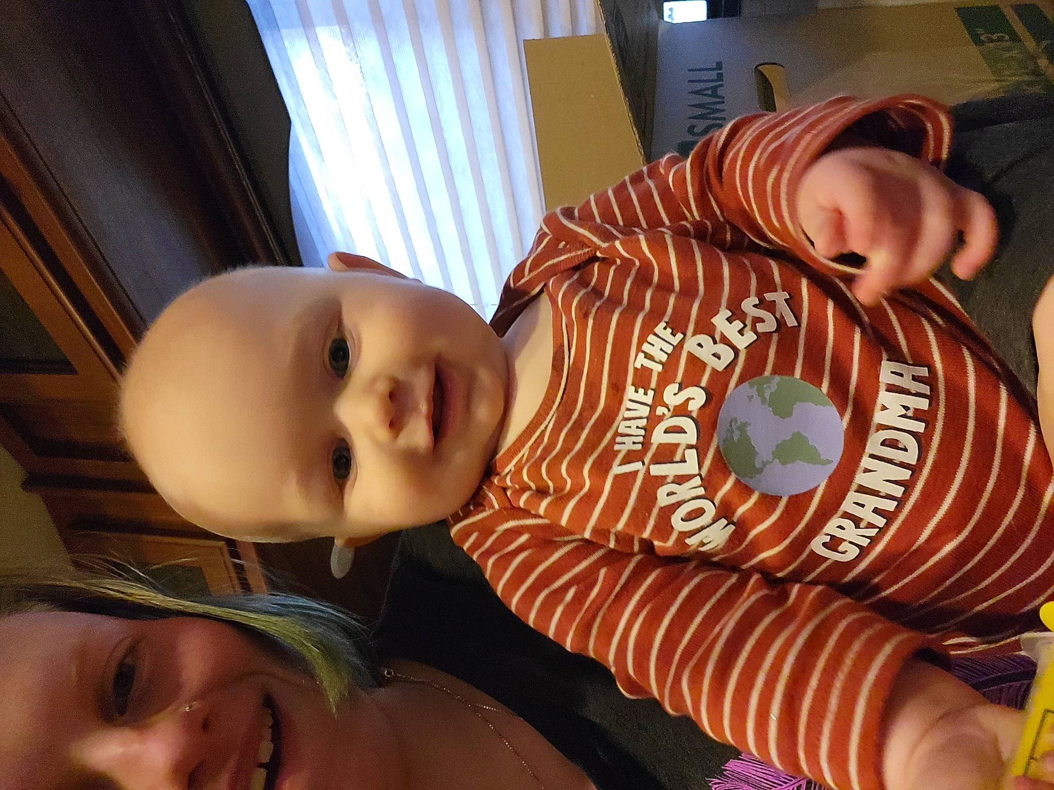 Hunter joined the competition — help win amazing prizes! baby, chair, cheek, child, comfort, eyelash, fun, happy, human_body, iris, joy, leisure, mammal, mouth, nose, orange, person, room, skin, smile