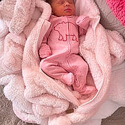 Xiyalize Royalty joined the competition — help win amazing prizes! newborn, baby, sleeping, pink, blanket, onesie, bear_graphic, cozy, soft, fluffy, infant, cute, warm, fabric, bed, resting, child, textile, zipper, portrait