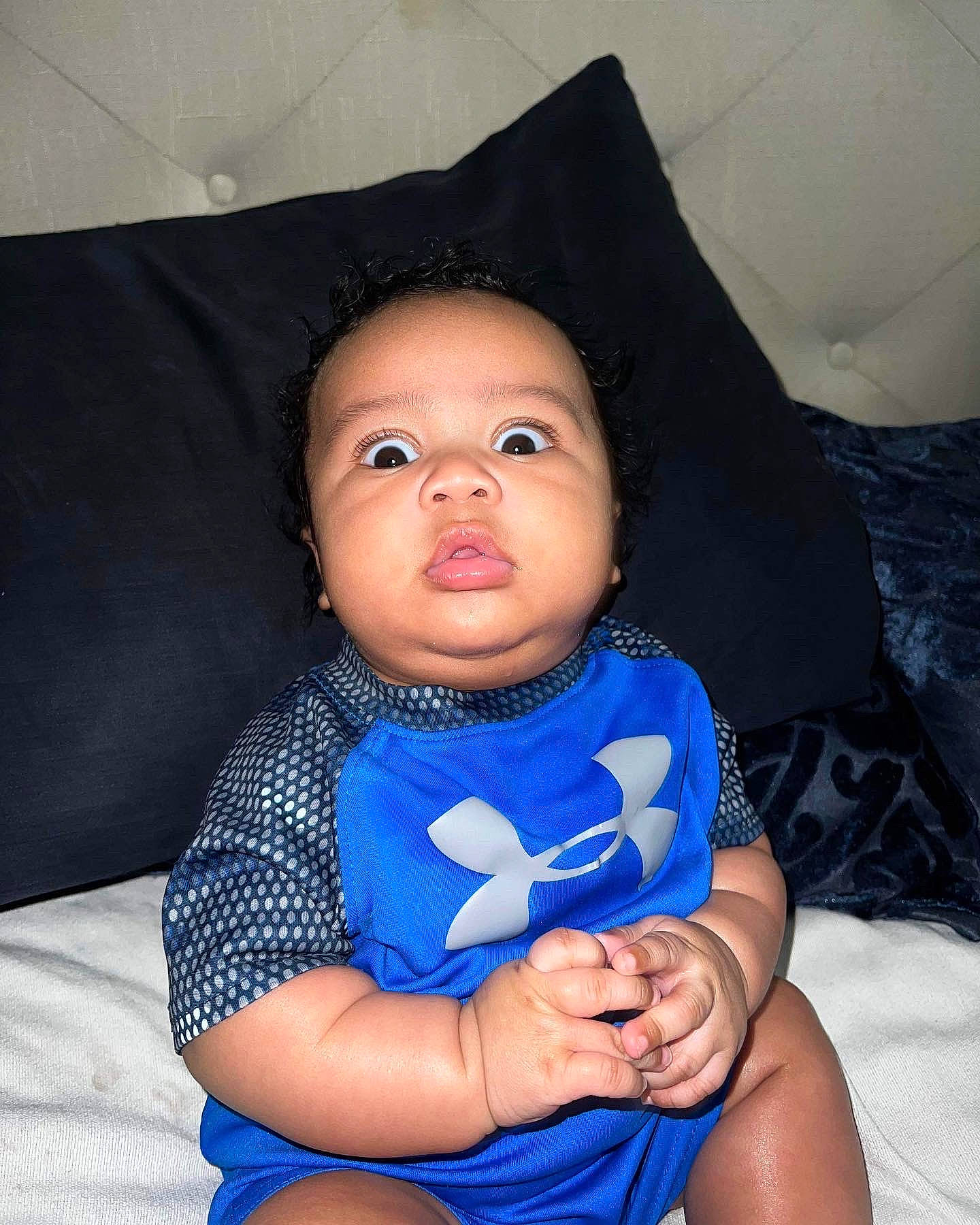 Makai is registered to the contest to win money with this photo: arm, azure, baby_toddler_clothing, cheek, comfort, eye, face, facial_expression, flash_photography, hairstyle, hand, head, human, joint, leg, lip, mouth, nose, person, skin