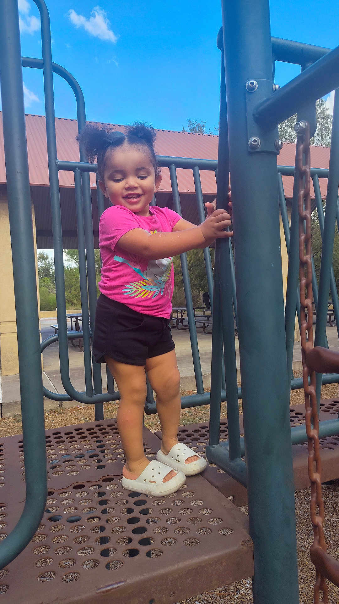 Ashanti is registered to the contest to win money with this photo: chair, child, clothing, desk, face, female, footwear, furniture, girl, grass, head, outdoorplayarea, outdoors, person, photography, plant, playarea, shoe, shorts, table