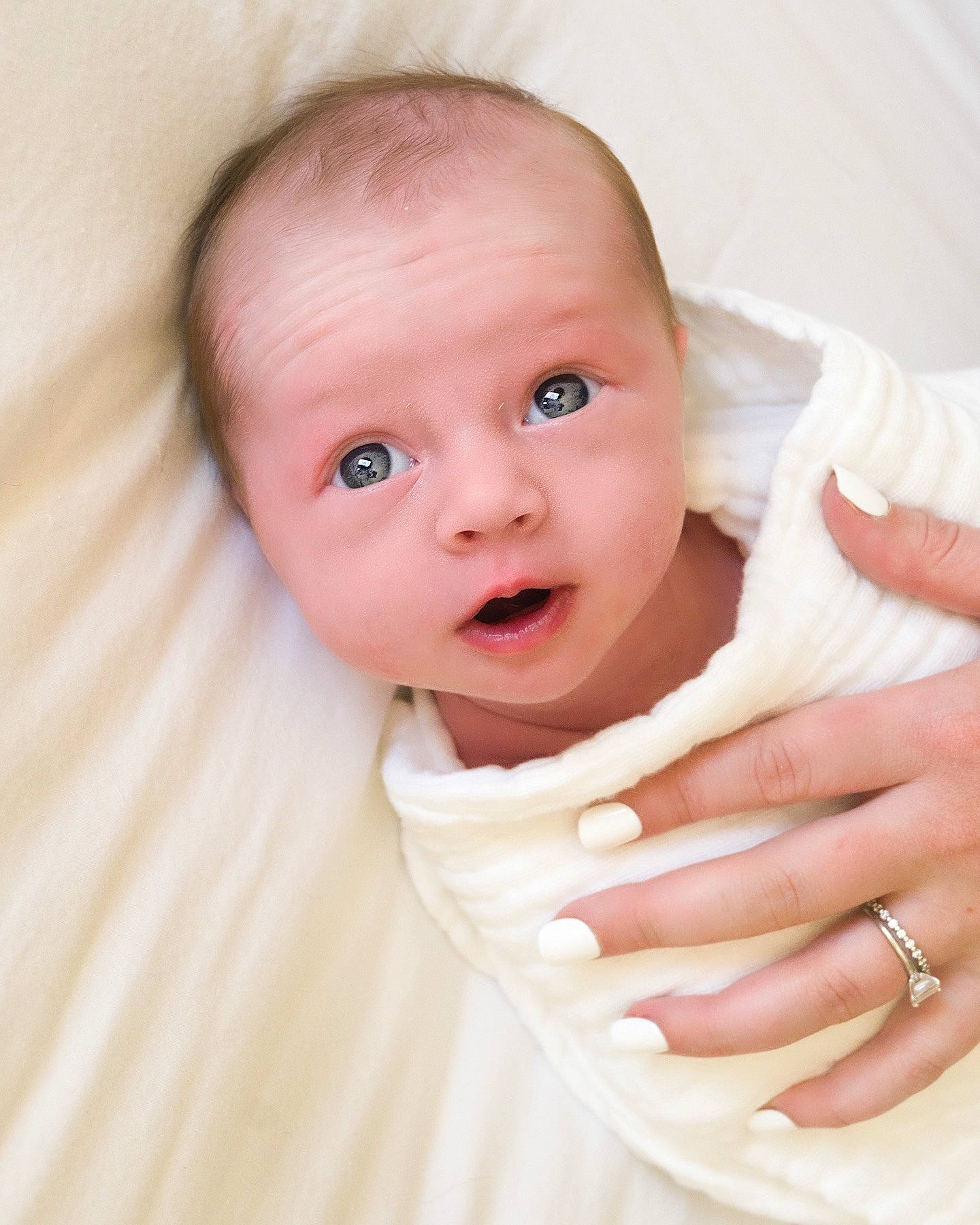 Charlotte is registered to the contest to win money with this photo: baby, baby_toddler_clothing, cheek, chin, comfort, eyebrow, eyelash, finger, gesture, happy, iris, lip, mouth, nail, nose, person, sleeve, smile, stomach, thumb