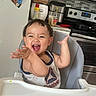 Kavien joined the competition — help win amazing prizes! appliances, baby_picture, child, clapping, cute, family_photos, food_tray, furniture, happy, high_chair, home, indoor, kitchen, magnet, person, refrigerator, smiling, tank_top, toddler, young_child