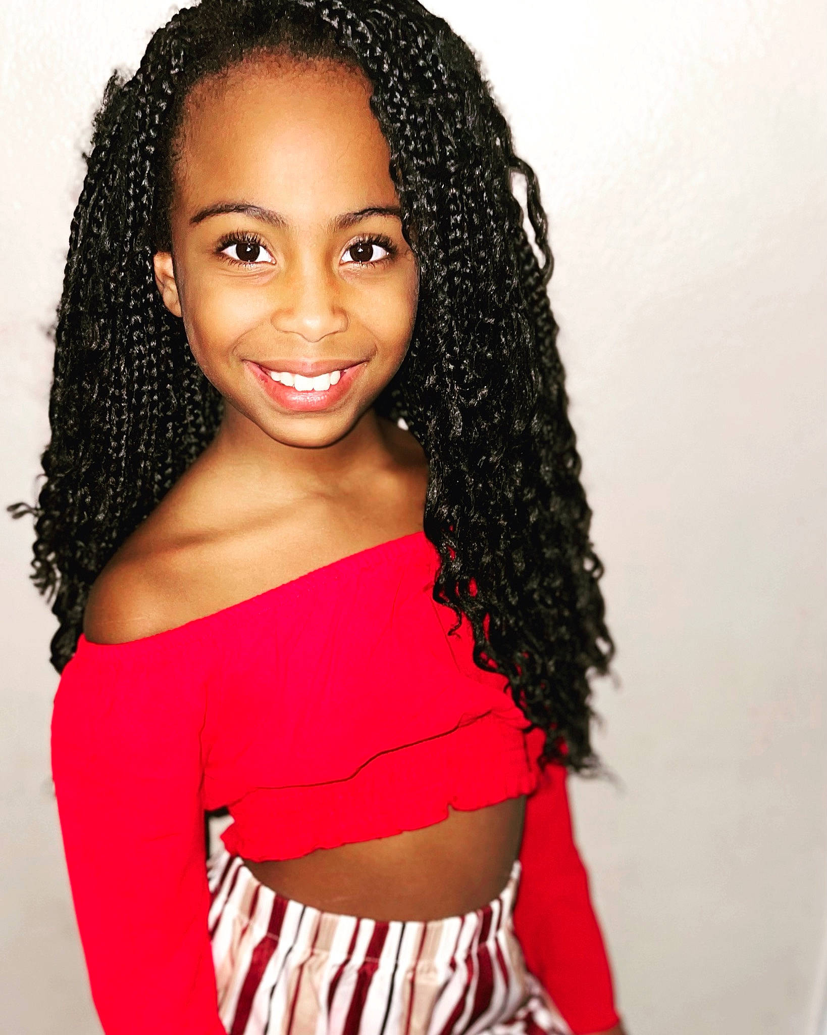 Kaliyah joined the competition — help win amazing prizes! black_hair, chin, eye, eyebrow, eyelash, face, facial_expression, fashion, hair, hairstyle, head, jheri_curl, joy, lace_wig, lip, makeover, organ, person, ringlet, sleeve