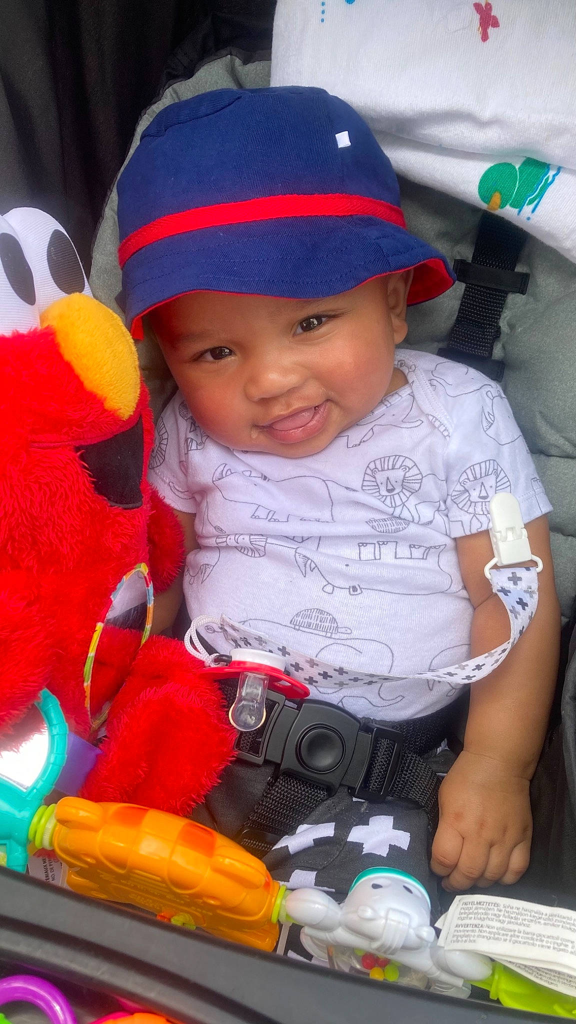 Juelz is registered to the contest to win money with this photo: baby, baby_products, baby_toddler_clothing, baseball_cap, beauty, cap, child, facial_expression, fun, happy, headwear, lap, person, photograph, pink, red, skin, smile, snapshot, toddler