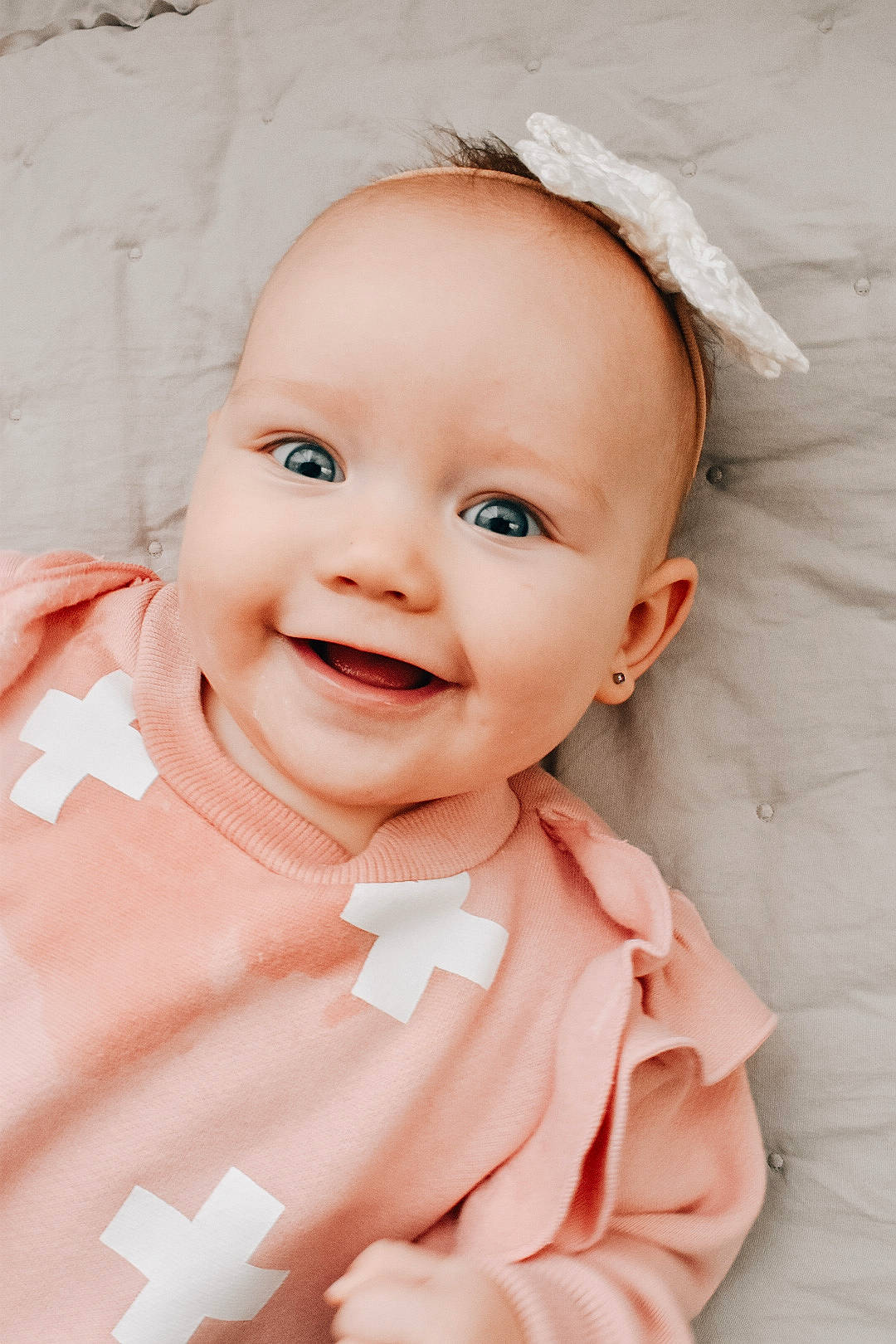 Charlee is registered to the contest to win money with this photo: baby, beauty, cheek, child, child_model, chin, eye, face, facial_expression, head, joy, lip, nose, person, photograph, photography, pink, portrait, portrait_photography, skin
