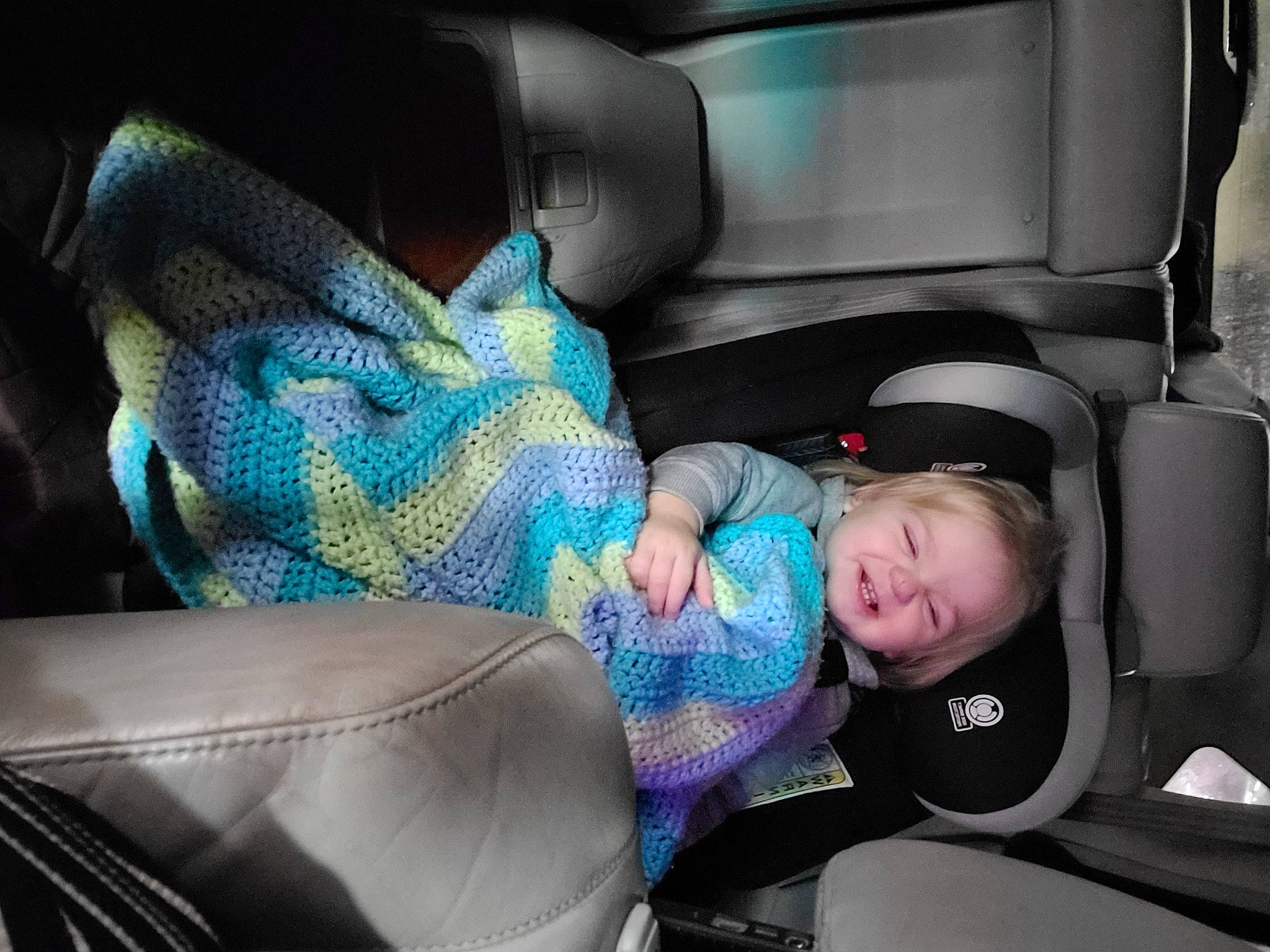 Evan is registered to the contest to win money with this photo: auto_part, automotive_design, automotive_exterior, baby, baby_in_car_seat, car, car_seat, car_seat_cover, comfort, electric_blue, family_car, head_restraint, mode_of_transport, motor_vehicle, passenger, person, personal_luxury_car, toddler, vehicle, vehicle_door