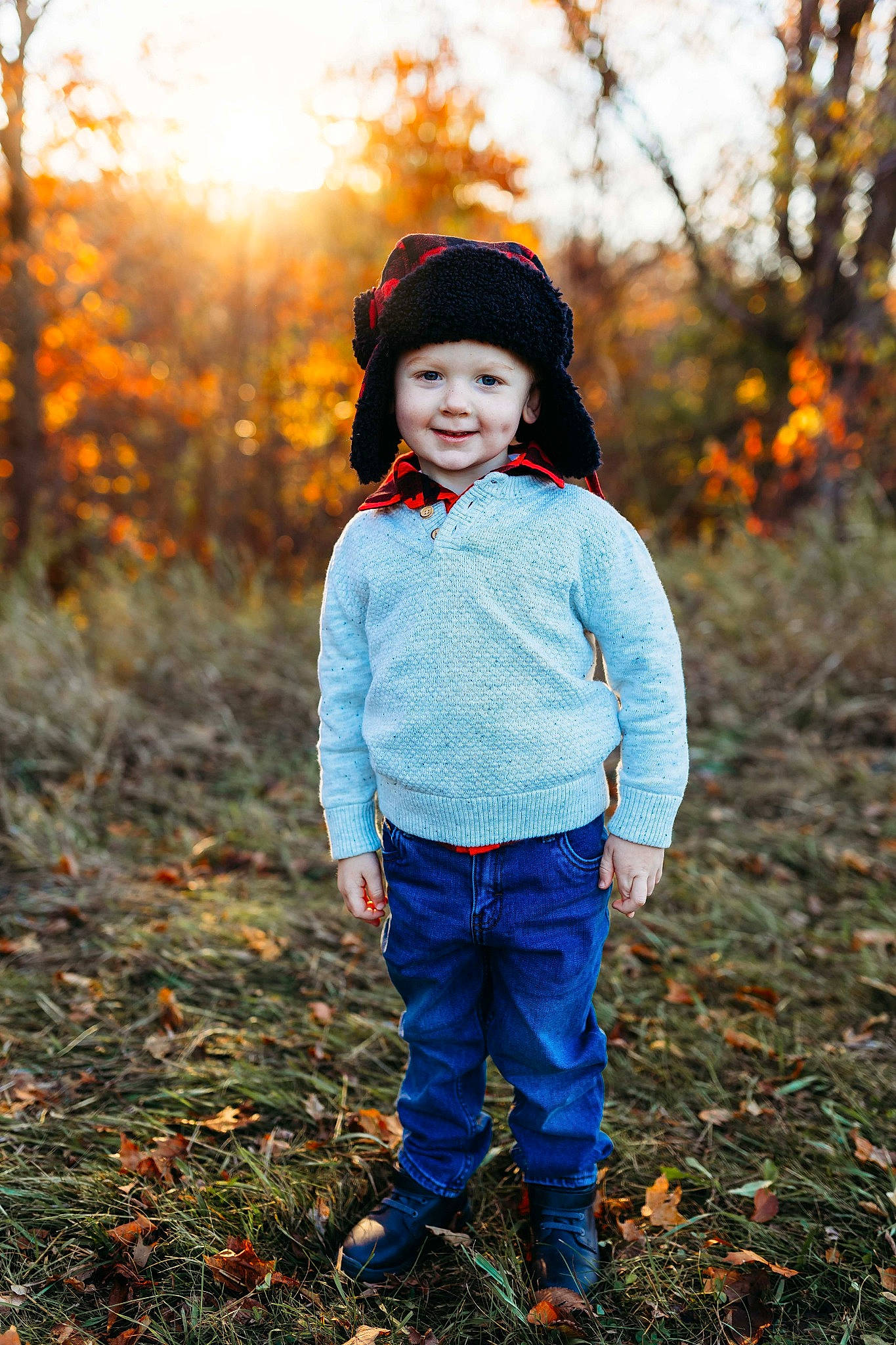 Douglas is registered to the contest to win money with this photo: beauty, eye, flash_photography, grass, happy, headgear, headwear, jeans, joy, leaf, orange, outerwear, people_in_nature, person, plant, smile, standing, sunlight, tints_and_shades, toddler