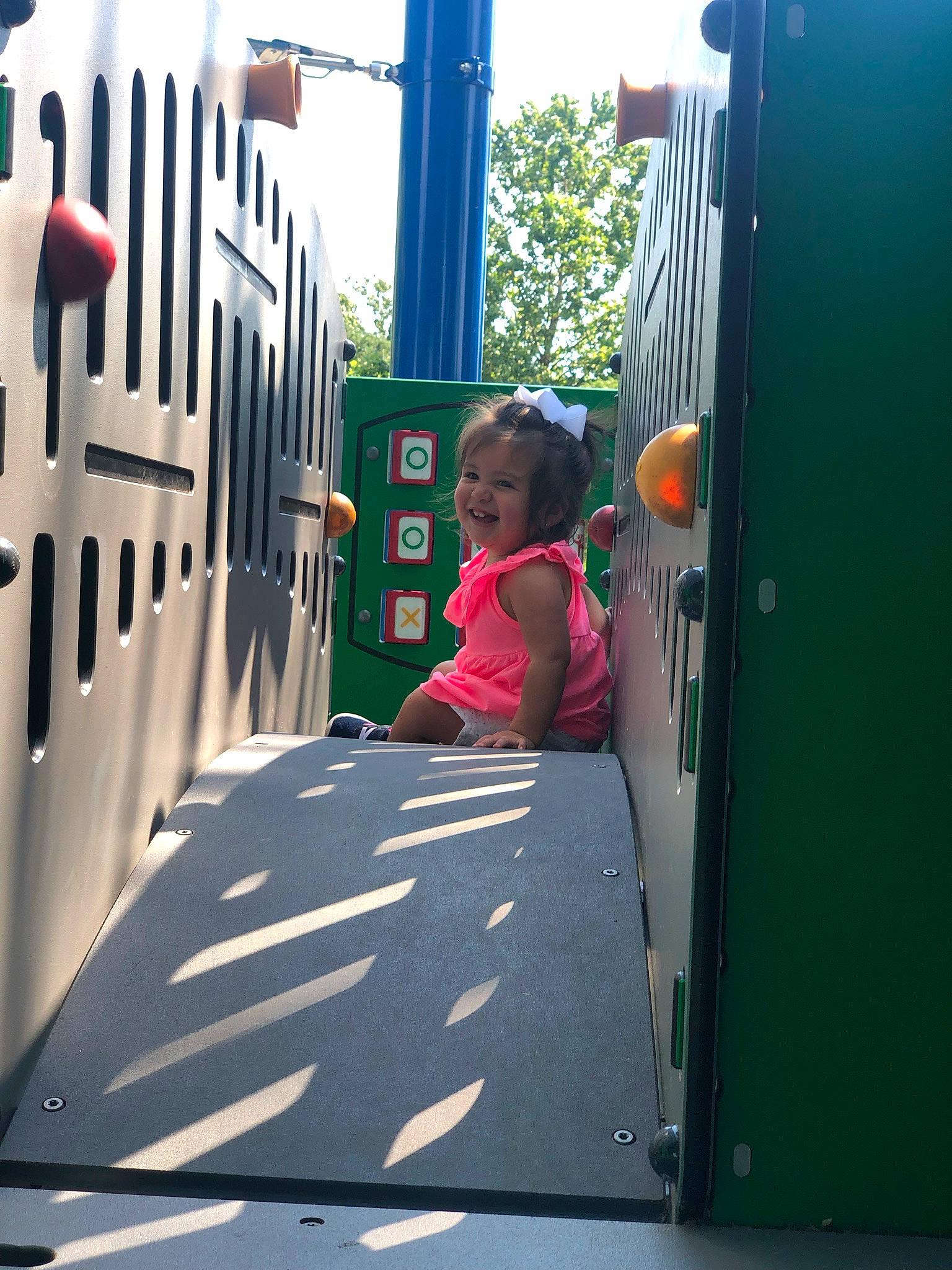 Elena is registered to the contest to win money with this photo: asphalt, automotive_design, automotive_exterior, automotive_tire, bumper, child, city, fun, grass, joy, leisure, mode_of_transport, motor_vehicle, person, product, public_space, recreation, shorts, standing, t_shirt