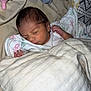 Amina joined the competition — help win amazing prizes! newborn, baby, sleeping, blanket, pacifier, bottle, bed, cozy, soft, infant, face, hand, resting, wrapped, cute, toddler, child, indoors, comfort, peaceful