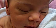 Amina joined the competition — help win amazing prizes! newborn, baby, sleeping, blanket, hand, face, skin, infant, closeup, soft, comfort, rest, peaceful, portrait, human, child, wrapped, cozy, pink, purple