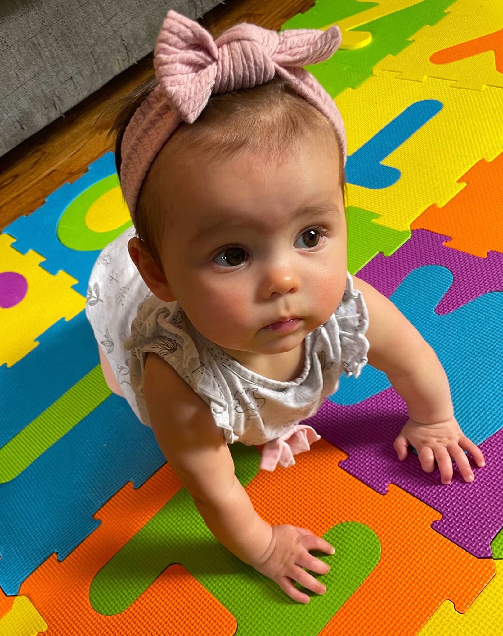 Alyssa joined the competition — help win amazing prizes! baby, baby_toddler_clothing, cheek, child, crawling, eyelash, flooring, fun, grass, hairstyle, happy, headpiece, leisure, pattern, people_in_nature, person, pink, play, skin, toddler