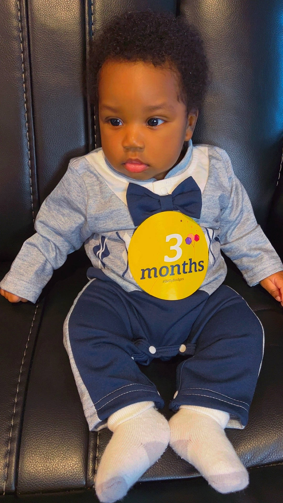 Mayokun joined the competition — help win amazing prizes! accessories, baby, clothing, couch, cushion, face, footwear, formalwear, furniture, head, homedecor, hosiery, pants, person, photography, portrait, shoe, sitting, sock, tie