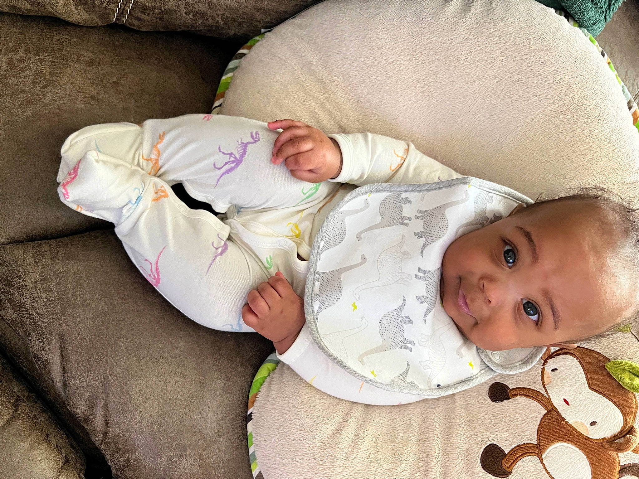 Chad is registered to the contest to win money with this photo: arm, baby, baby_products, baby_toddler_clothing, cheek, child, comfort, eye, grass, hand, happy, human_body, linens, nap, person, sitting, skin, sleeve, textile, toddler