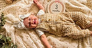 Juniper joined the competition — help win amazing prizes! baby, blanket, child, cozy, cute, decor, fabric, greenery, happy, headband, indoors, infant, laying_down, overalls, portrait, smiling, soft_light, teddy_bear, three_months, tongue_out