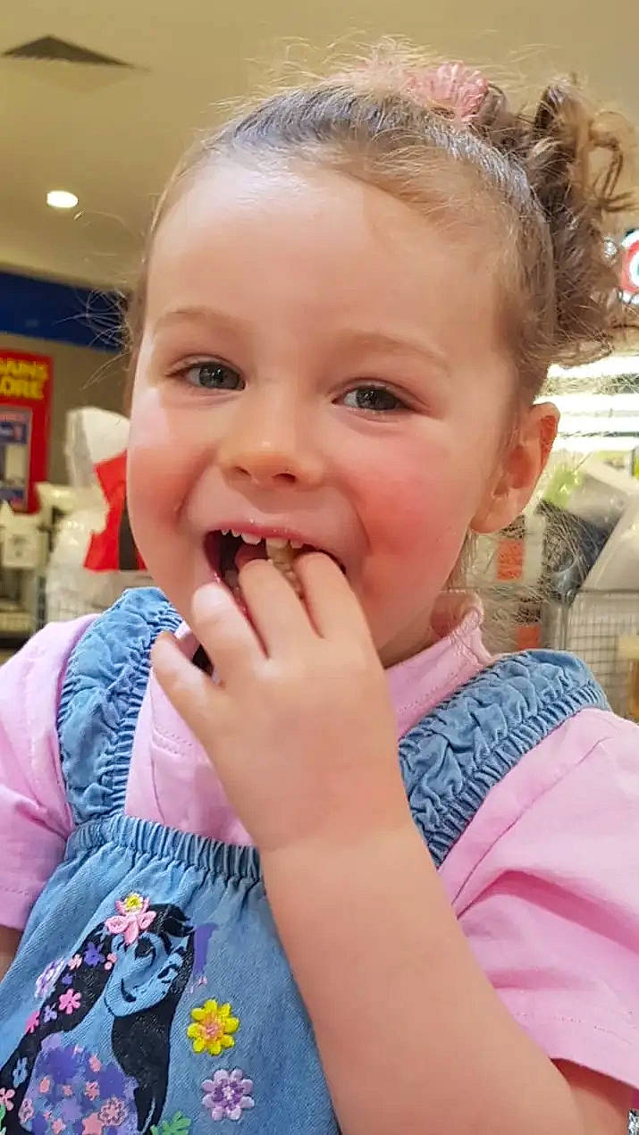 Lilly-anne is registered to the contest to win money with this photo: baby_toddler_clothing, cheek, chin, ear, electric_blue, eyelash, fun, gesture, happy, head, iris, lip, mouth, nail, nose, person, skin, smile, thumb, toddler