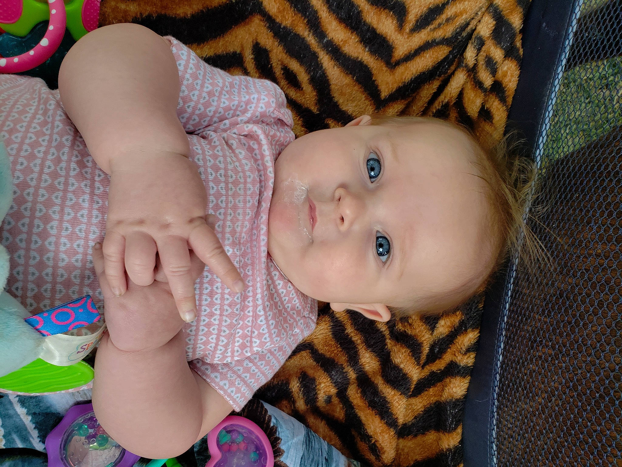 Emmora is registered to the contest to win money with this photo: baby, cheek, child, eye, finger, iris, leg, nail, person, pink, product, skin, toddler
