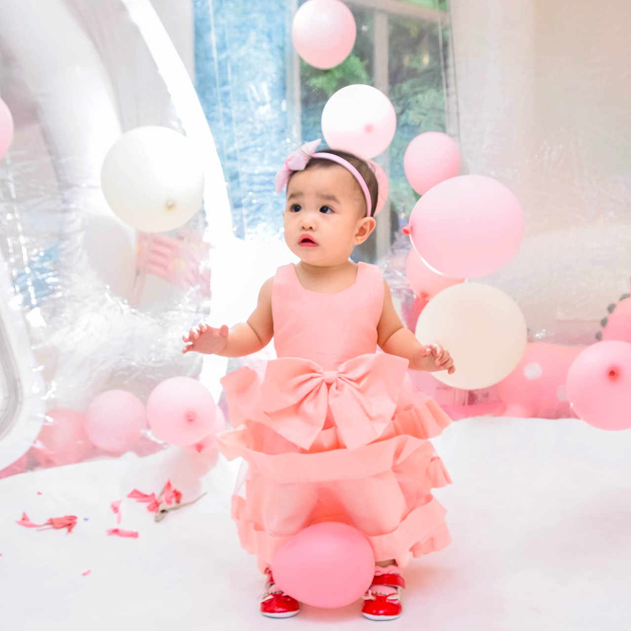 Harper joined the competition — help win amazing prizes! baby, balloon, celebrating, clothing, dress, face, fashion, festival, fun, happy, hat, head, party, people, person, photography, portrait, sitting, smile, sphere