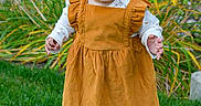Aurora is registered to the contest to win money with this photo: toddler, child, grass, outdoor, dress, barefoot, smiling, person, greenery, park, nature, young, baby, cute, standing, happy, plants, daylight, casual, innocence