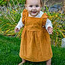 Aurora is registered to the contest to win money with this photo: toddler, child, grass, outdoor, dress, barefoot, smiling, person, greenery, park, nature, young, baby, cute, standing, happy, plants, daylight, casual, innocence