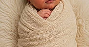 Luca is registered to the contest to win money with this photo: newborn, baby, sleeping, wrapped, blanket, knit, cozy, soft, cream, beige, infant, cute, peaceful, portrait, cocooned, child, resting, fuzzy, warm, toddler