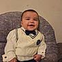Antonio joined the competition — help win amazing prizes! baby, infant, child, smile, bow_tie, sweater, white_shirt, sitting, chair, cushion, portrait, face, hands, cute, adorable, indoor, wall, happy, cheeks, clothing