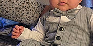 Antonio joined the competition — help win amazing prizes! baby, infant, child, bow_tie, hat, cap, striped_suit, vest, sneakers, shoes, sitting, portrait, indoors, bed, blanket, hand, cheeks, dark_eyes, cute, formal_outfit