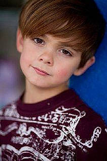 Alexander is registered to the contest to win money with this photo: bangs, black_hair, brown_hair, cheek, child, child_model, chin, crop, eye, eyebrow, face, forehead, hair, hairstyle, jaw, lip, nose, person, pixie_cut, portrait