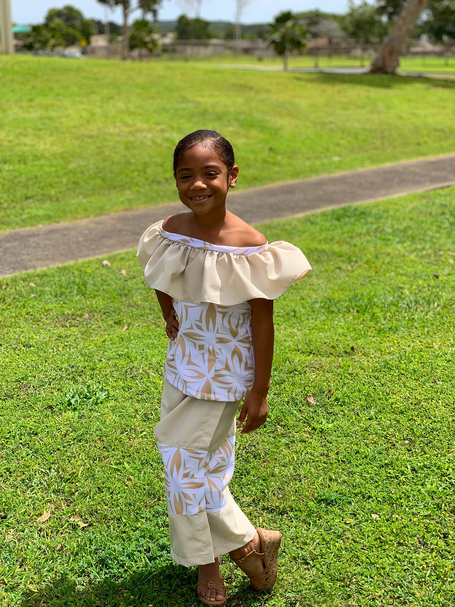 Desiree is registered to the contest to win money with this photo: adaptation, child, fun, grass, grass_family, grassland, green, happy, joy, person, plant, shoulder, smile, vacation, walking, white