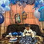 Alayna joined the competition — help win amazing prizes! balloons, birthday, blue, cake, celebration, child, curtains, decorations, dress, festive, flower, girl, happy, headband, indoors, number_one, party, smile, sofa, table