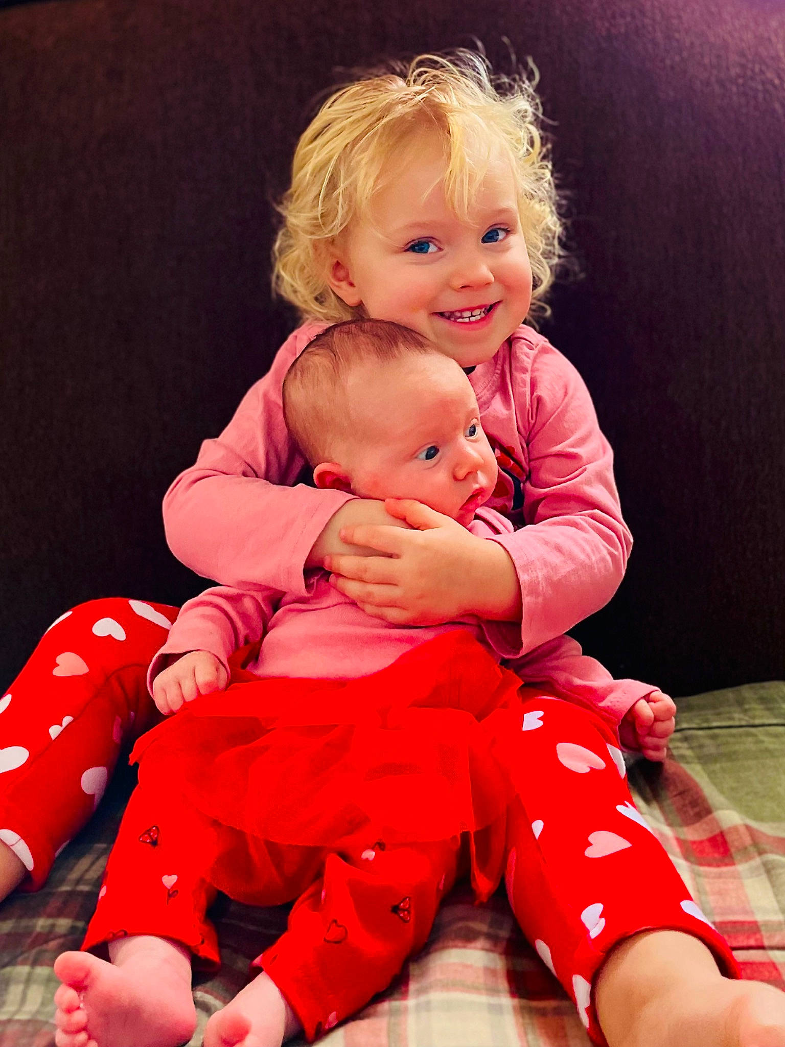 Vada joined the competition — help win amazing prizes! arm, baby, baby_toddler_clothing, cheek, child, comfort, facial_expression, finger, fun, gesture, happy, joy, knee, lap, leg, person, pink, skin, sleeve, smile