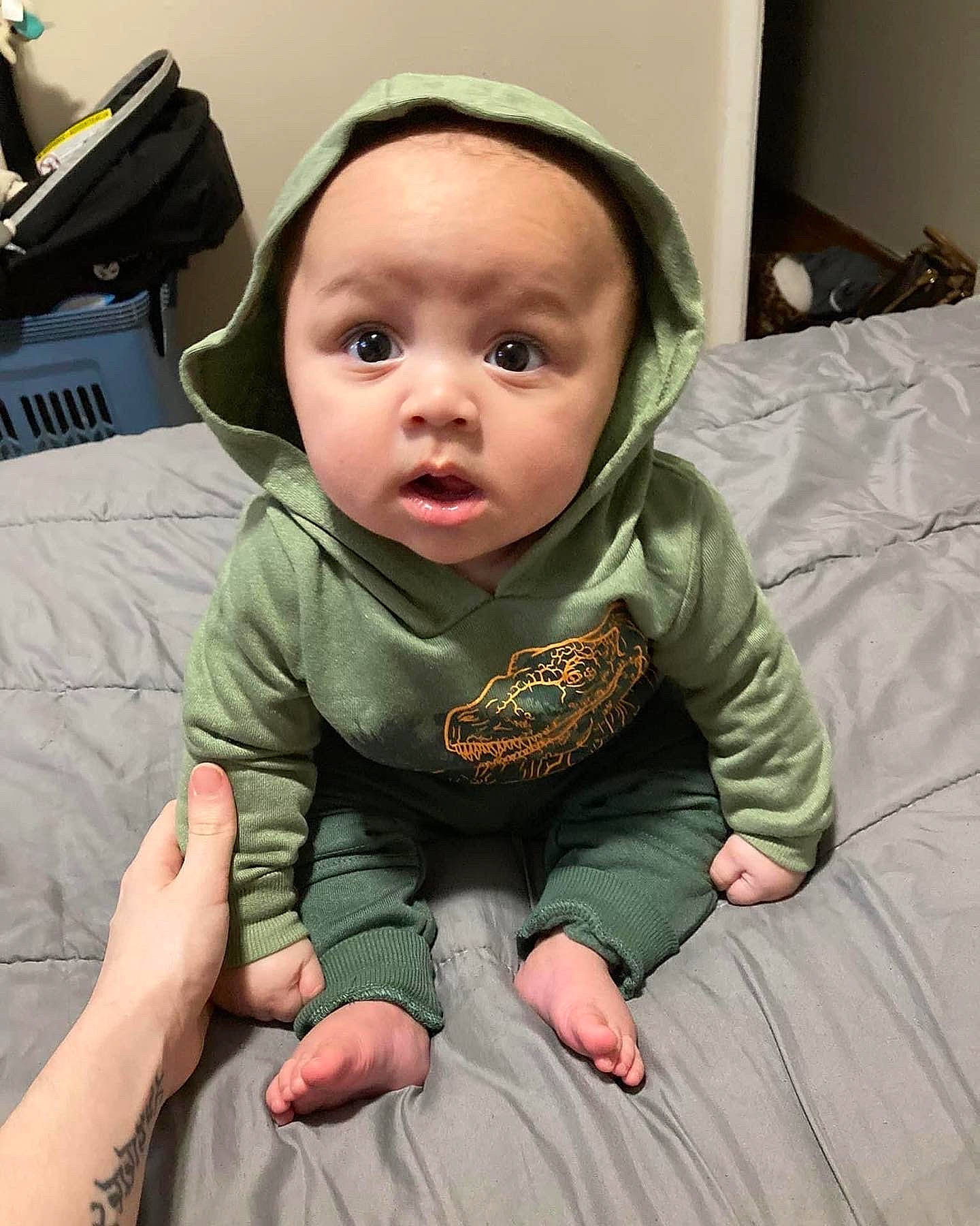 Jaydon joined the competition — help win amazing prizes! baby, baby_safety, baby_toddler_clothing, cheek, child, comfort, eye, eyelash, fun, nose, person, room, sitting, sleeve, surprise, thumb, toddler