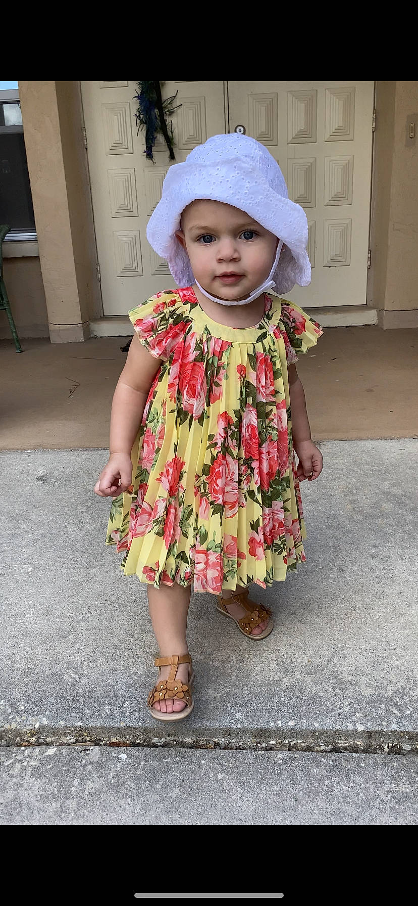Svea is registered to the contest to win money with this photo: baby, baby_toddler_clothing, beauty, cap, child, day_dress, dress, eye, headwear, leg, magenta, one_piece_garment, pattern, person, pink, purple, sandal, shoe, skin, sleeve