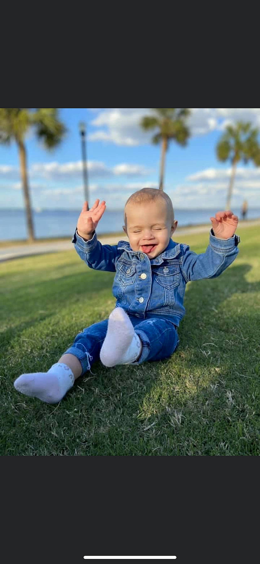 Svea is registered to the contest to win money with this photo: baby, baby_toddler_clothing, cloud, facial_expression, flash_photography, fun, gesture, grass, grassland, happy, leisure, people_in_nature, person, plant, recreation, sky, smile, sunlight, swing, toddler