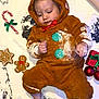 Anakin joined the competition — help win amazing prizes! baby, baking, candy_cane, child, christmas, cookie_cutter, cute, festive, floor, flour, foot, gingerbread_costume, green_buttons, holiday, holiday_decor, infant, ornaments, playful, red_bow, rolling_pin