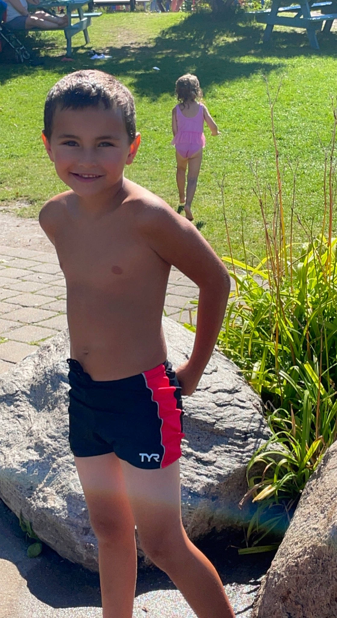 Maverick participe au concours pour gagner de l'argent avec cette photo : abdomen, chest, grass, happy, human_leg, joy, knee, leg, leisure, people_in_nature, person, photograph, plant, shorts, shoulder, smile, summer, thigh, toddler, trunk