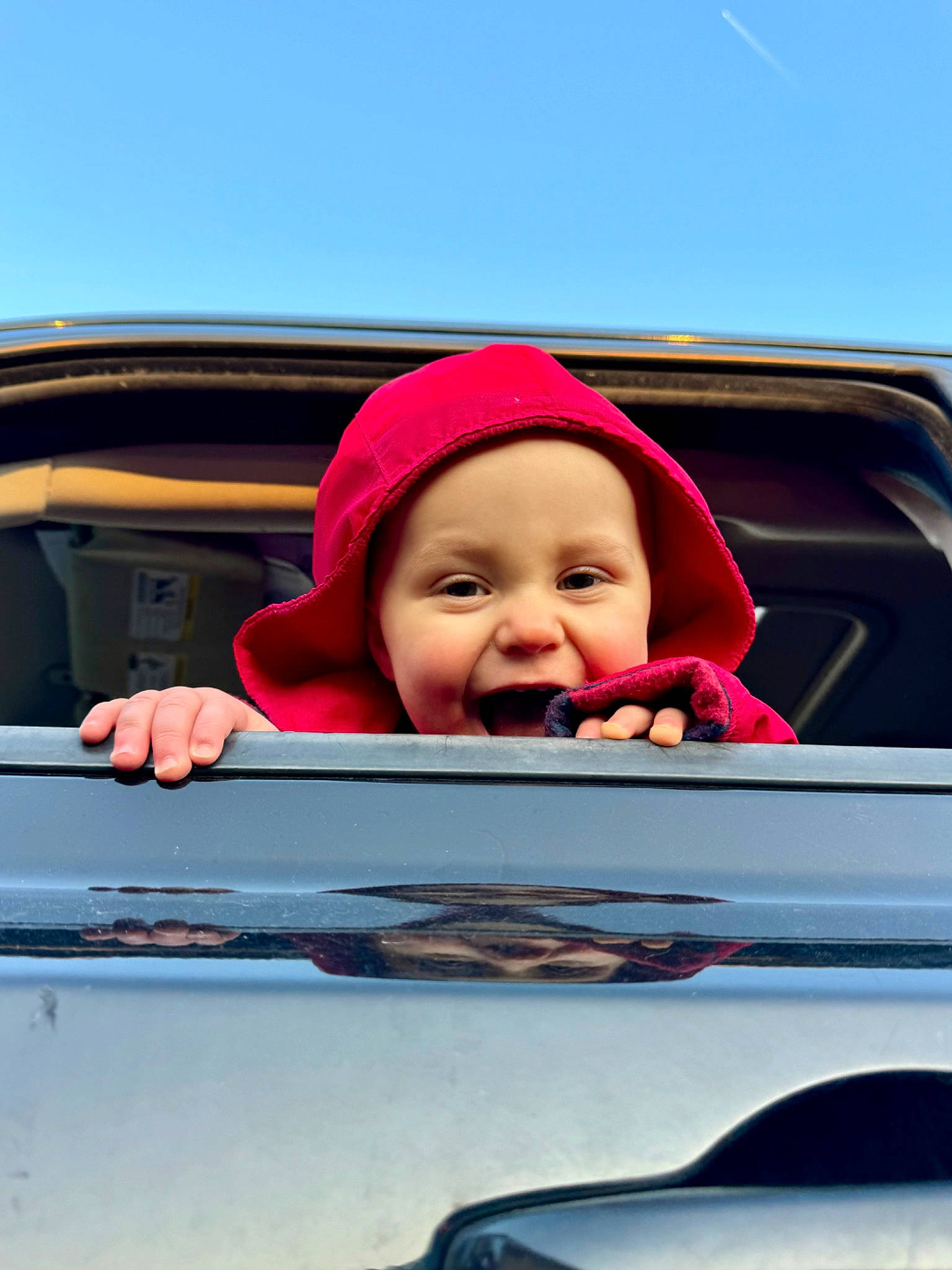 Sawyer joined the competition — help win amazing prizes! automotive_design, automotive_exterior, automotive_lighting, automotive_mirror, automotive_tire, automotive_wheel_system, bumper, car, facial_expression, fun, grille, happy, headwear, hood, motor_vehicle, person, personal_luxury_car, sky, smile, toddler