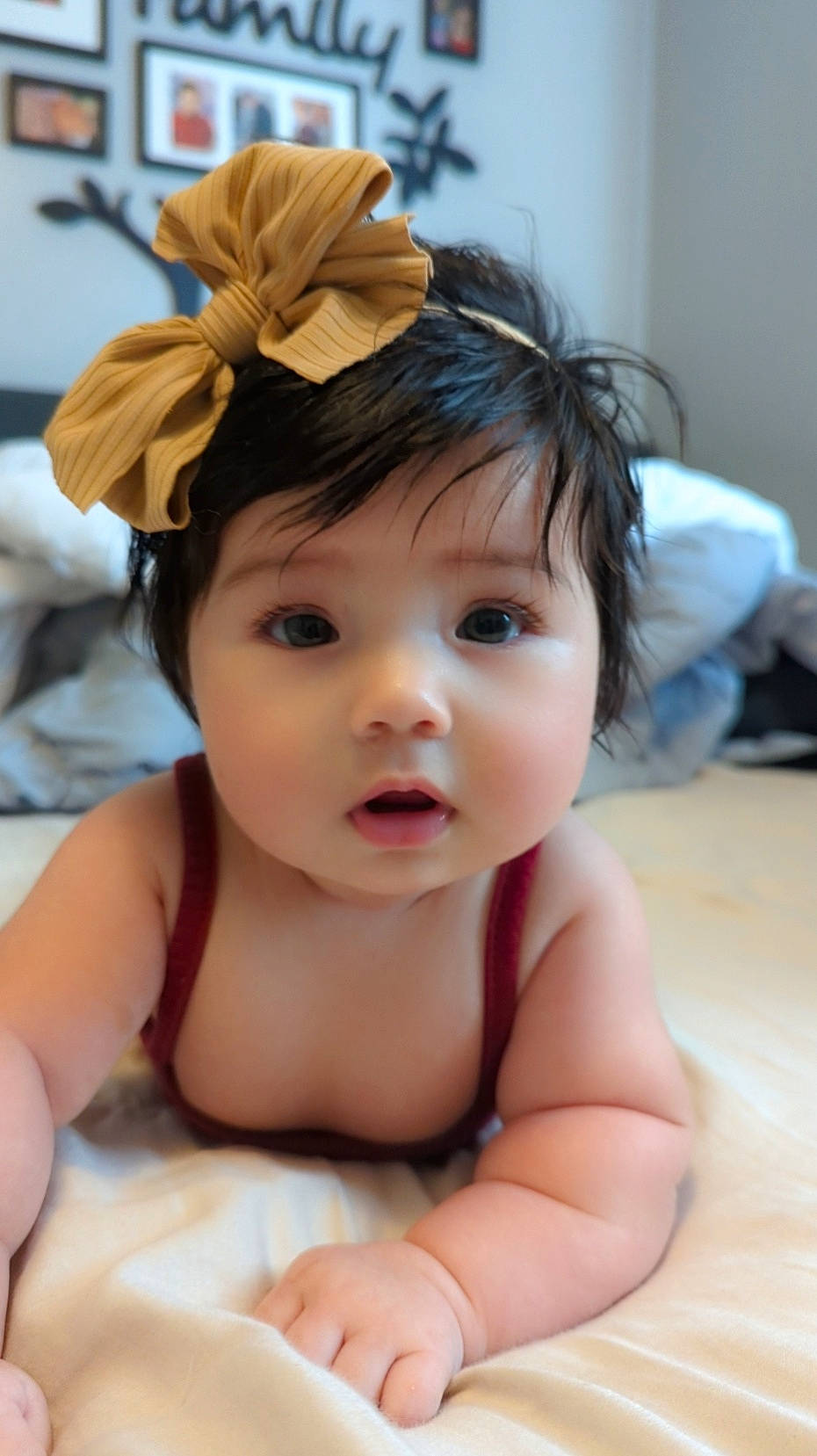 Malaya is registered to the contest to win money with this photo: baby, baby_toddler_clothing, black_hair, cheek, child, chin, ear, eye, eyebrow, eyelash, facial_expression, happy, headgear, headpiece, iris, lip, neck, nose, person, skin