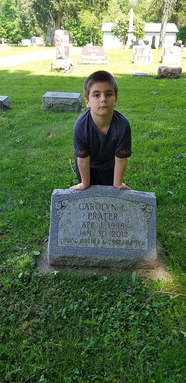 Corbyn joined the competition — help win amazing prizes! cemetery, grass, grave, headstone, memorial, nonbuilding_structure, person, stone_carving