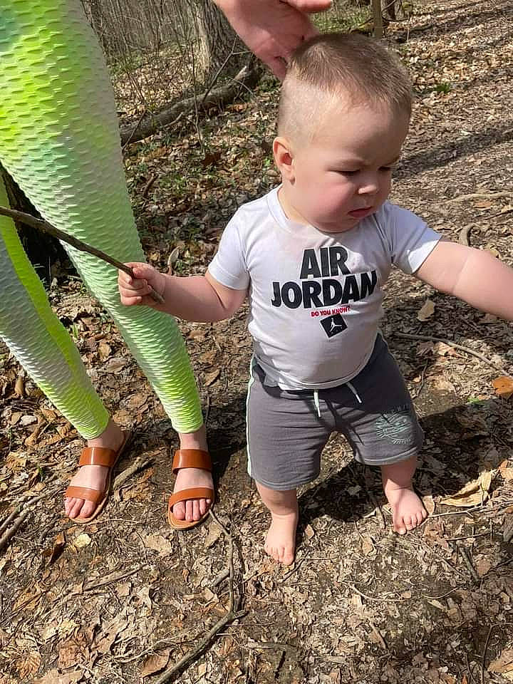 Harrison joined the competition — help win amazing prizes! adaptation, arecales, banana_family, barefoot, child, foot, fun, grass, grass_family, happy, people_in_nature, person, plant, shorts, sitting, soil, t_shirt, terrestrial_plant, thigh, toddler