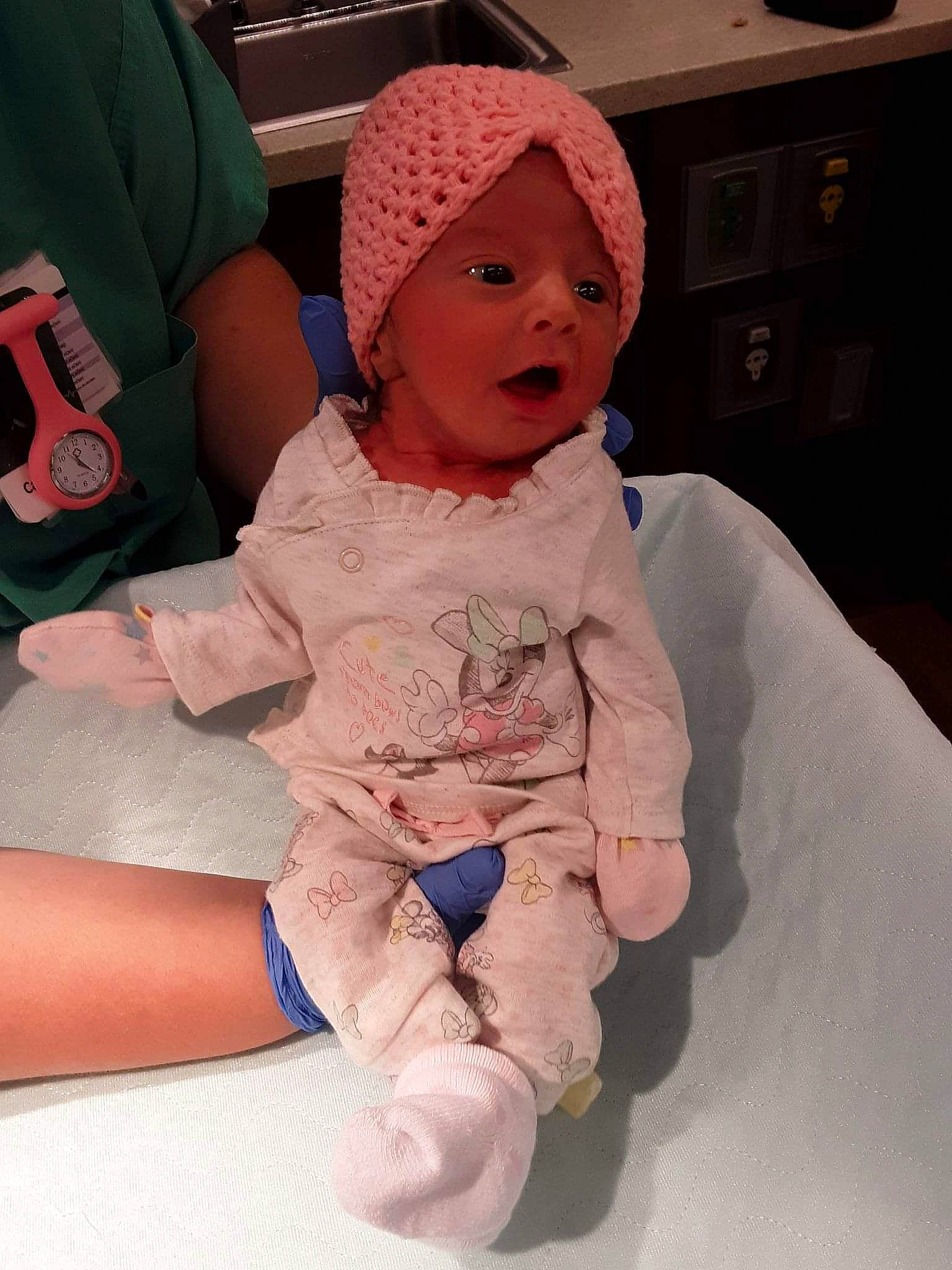 Vaida joined the competition — help win amazing prizes! baby, baby_toddler_clothing, cap, carmine, cheek, child, comfort, finger, hat, headgear, headwear, human_leg, lap, linens, person, pink, sitting, skin, sleeve, sock