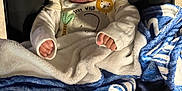 Zackaron joined the competition — help win amazing prizes! baby, infant, car_seat, blanket, hat, clothing, face, eyes, hands, cute, child, indoor, portrait, expression, comfort, warm, soft, animal_patch, wild, cozy