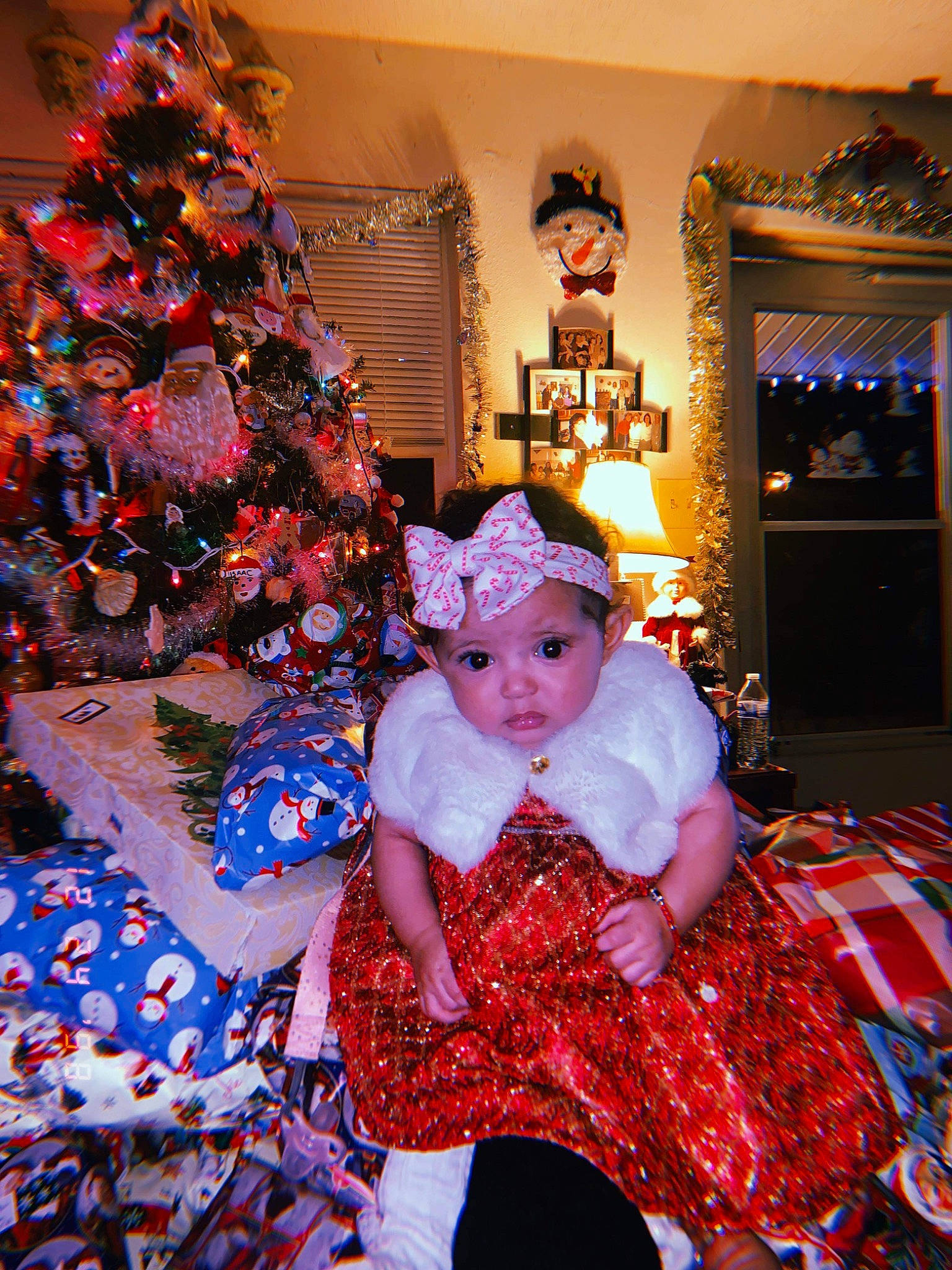 Adelina joined the competition — help win amazing prizes! baby_toddler_clothing, christmas, christmas_decoration, christmas_eve, christmas_ornament, christmas_tree, event, fun, happy, hat, headwear, holiday, holiday_ornament, lap, magenta, ornament, person, plant, purple, toddler